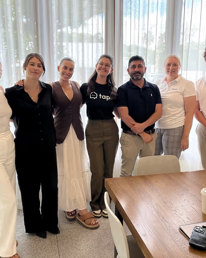 Part of the Tapi team together in the office.