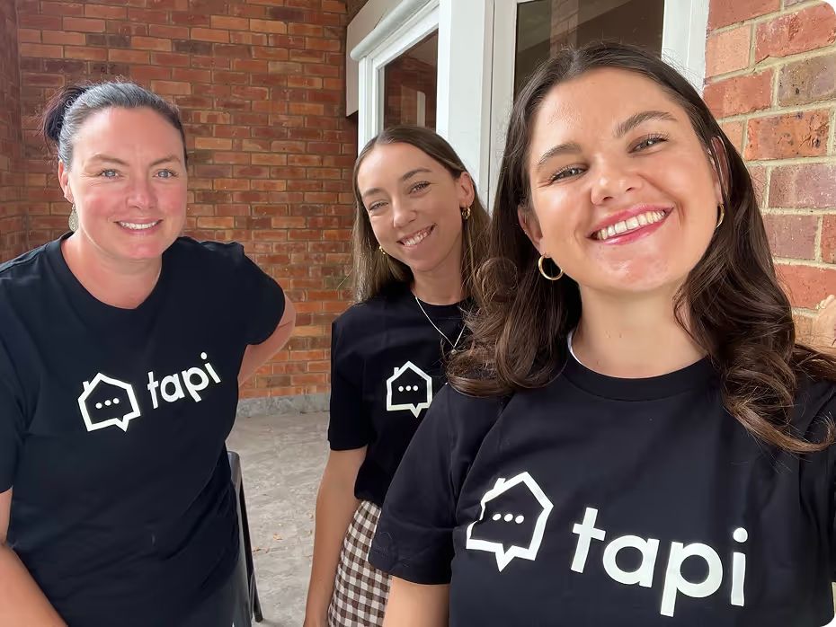 Three of the Tapi team in Tapi t-shirts.