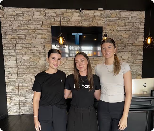 Three of the Tapi team at a customer's office.